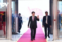 Le Président de la République, Luong Cuong à l’ouverture solennelle du XIVe Congrès national du Parti, organisée au Centre national des congrès (Hanoi).