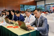 Les journalistes au Centre de presse du XIVᵉ Congrès du Parti. Photo : The Dung.