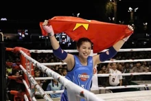 Phung Thi Hông Tham remporte la médaille d'or dans la catégorie amateur féminine des 63 kg aux Championnats du monde de Kun Khmer 2026. Photo : NLĐ/CVN.