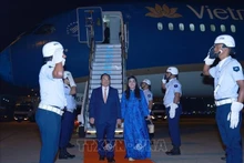 Le Premier ministre Pham Minh Chinh, son épouse Lê Thi Bich Trân et une délégation vietnamienne de haut rang ont atterri tôt le 5 juillet (heure locale) à l'aéroport Galeão de Rio de Janeiro tôt le 5 juillet (heure locale), entamant ainsi leur participation au sommet élargi des BRICS et aux activités bilatérales au Brésil. Photo : VNA.