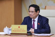 Le Premier ministre Pham Minh Chinh lors de la réunion. Photo : VNA.