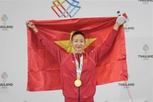 La Vietnamienne Hoàng Thi My Tâm a décroché une médaille d'or dans la catégorie des moins de 61 kg. Photo : VNA/CVN.