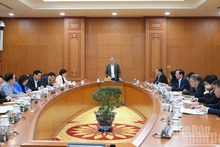  Le Secrétaire général To Lam préside la séance de travail.