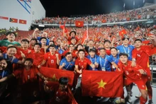 Les joueurs du Vietnam U22 exultent après leur victoire. Photo : VNA.