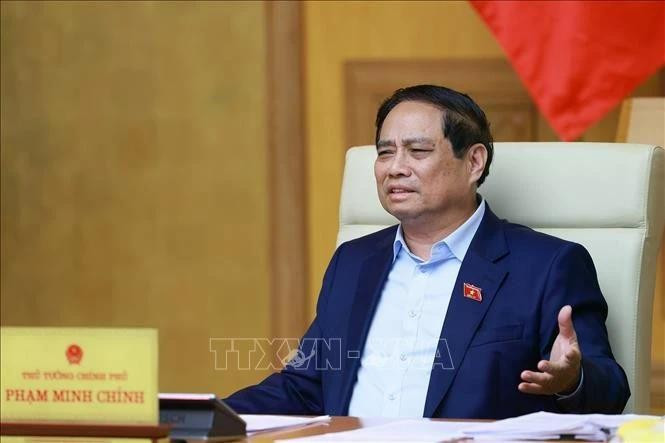 Le Premier ministre Pham Minh Chinh s'exprime lors de la réunion. Photo : VNA. 