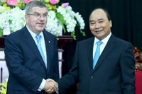 Le PM vietnamien, Nguyên Xuân Phuc (à droite), et le Docteur Thomas Bach, Président du CIO. Photo: VGP.