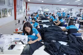 Les machines modernes contribuent à accroître la productivité du travail. Photo : VNA