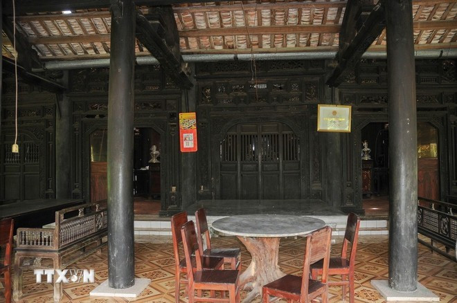Les anciennes maisons de Dong Hoa Hiep conservent encore de nombreux objets anciens de grande valeur. Photo : VNA.