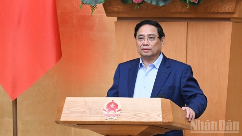 Le Premier ministre Pham Minh Chinh lors de la réunion du gouvernement le 5 octobre. Photo : NDEL. pmc-9.jpg