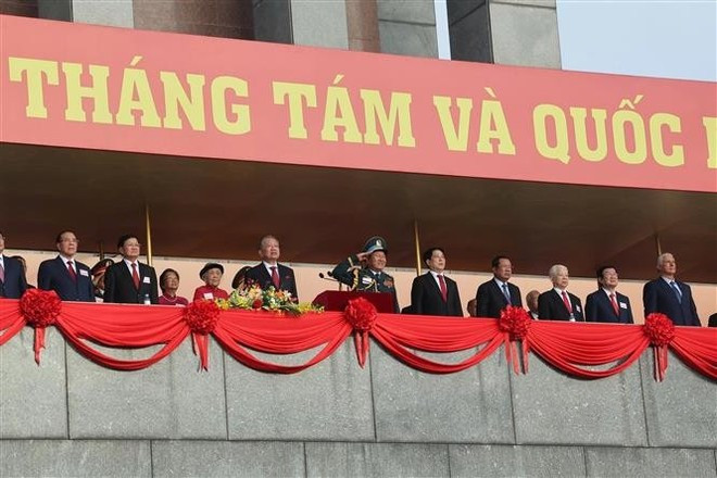 Des dirigeants du Parti, de l'Etat, du gouvenement et les délégués lors de la cérémonie. Photo : VNA. ld-80.jpg