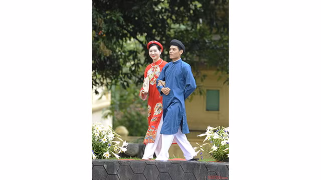 La beauté traditionnelle du "áo dài" ảnh 6 La beauté traditionnelle du "áo dài" ảnh 6