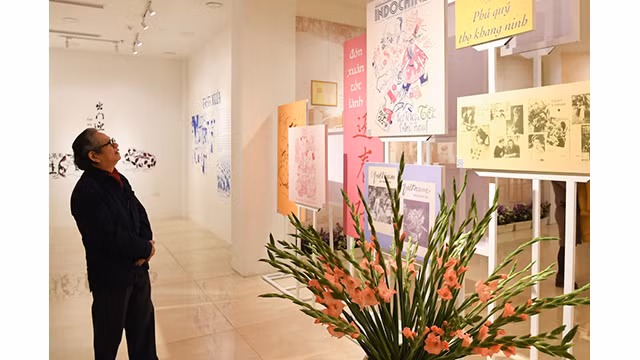  L’exposition « Têt d’autrefois » présente plus de 100 documents et images uniques sur le Têt traditionnel ảnh 10