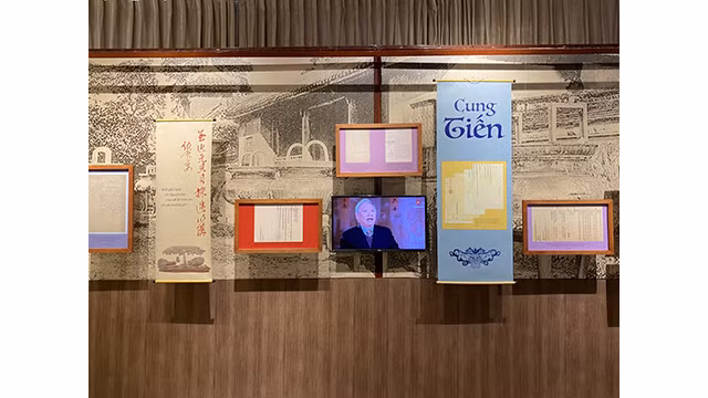  L’exposition « Têt d’autrefois » présente plus de 100 documents et images uniques sur le Têt traditionnel ảnh 7