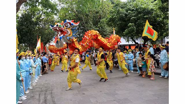 Plus de 600 personnes participent à la procession au temple Dô ảnh 2
