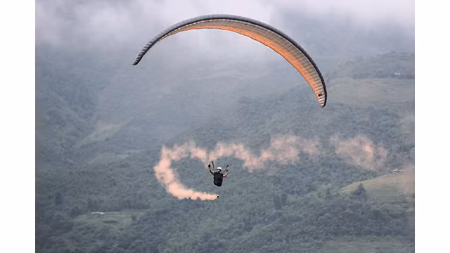 Expérience de parapente au-dessus des rizières dorées à Mù Cang Chai ảnh 12