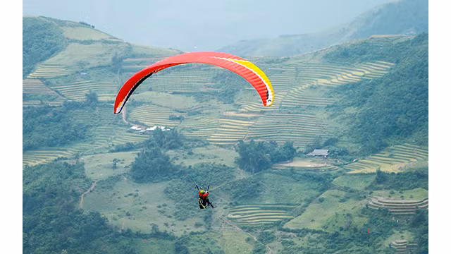 Expérience de parapente au-dessus des rizières dorées à Mù Cang Chai ảnh 9