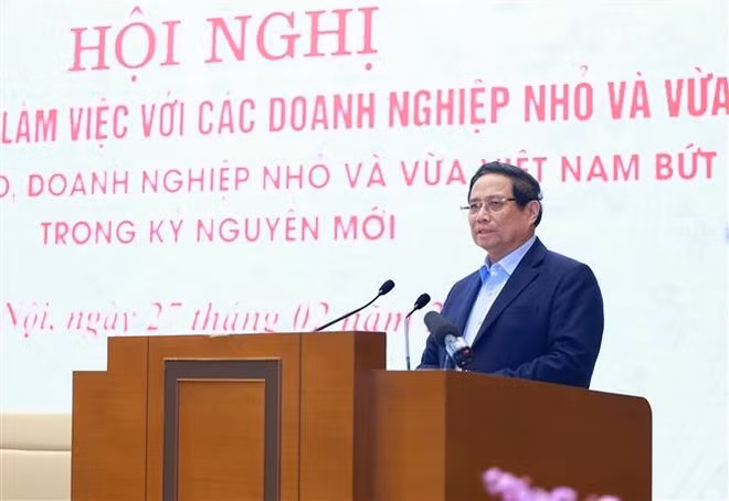 Le Premier ministre Pham Minh Chinh s'exprime lors de la conférence. Photo: VNA