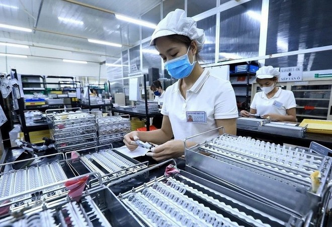 L'adoption de l'IMM permet au Vietnam de conserver les investisseurs et de concrétiser son objectif d'améliorer la qualité des flux de capitaux à l'avenir. Photo : VNA.