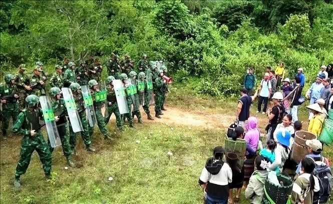 Scène de l’exercice conjoint de protection frontalière entre le Vietnam et le Laos. Photo : VNA.