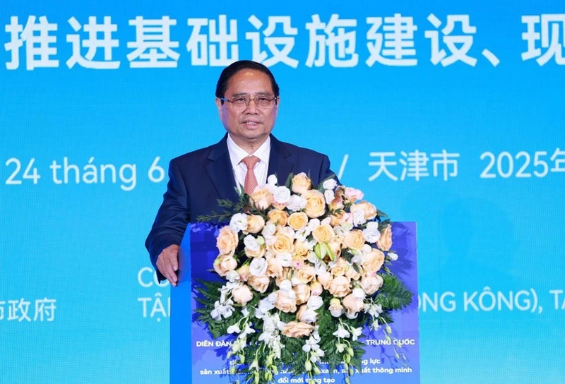 Le Premier ministre Pham Minh Chinh s'exprime lors du Forum des entreprises Chine-Vietnam. Photo: VNA.