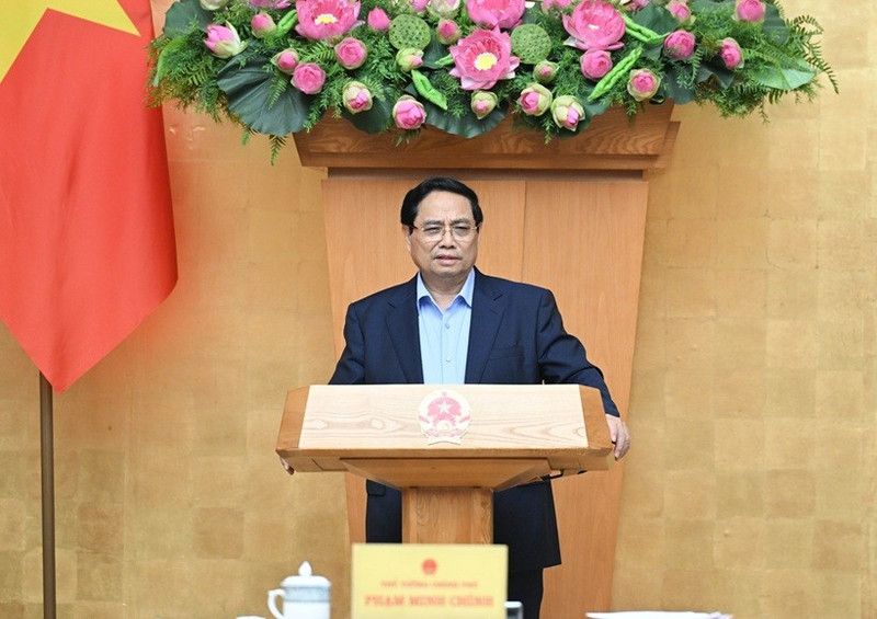 Le Premier ministre Pham Minh Chinh prend la parole lors de la réunion. Photo : NDEL.