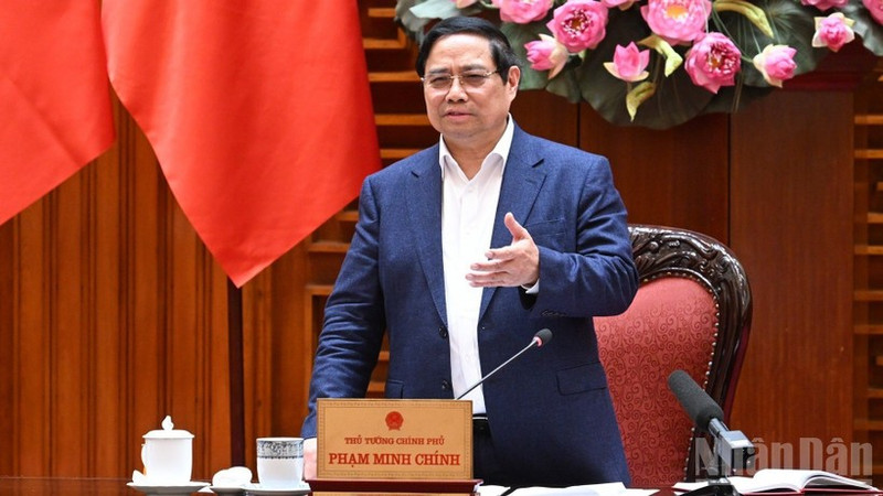 Le Premier ministre Pham Minh Chinh s'exprime lors de la réunion du 10 mars. Photo: NDEL.