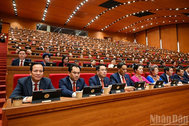 Les délégués assistent à la séance d’ouverture du XIVe Congrès national du Parti. Photo : NDEL.