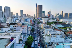 [Photo] Ho Chi Minh-Ville : le projet d’élargissement de l’axe Nguyen Tat Thanh pour fluidifier la circulation