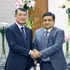 Le Premier ministre vietnamien Le Minh Hung (à gauche) et Sanjay Dhawan, vice-président du groupe ACME. Photo : VNA.