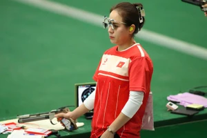 La tireuse Trinh Thu Vinh maintient une performance constante à chaque tir. Photo : nhandan.vn