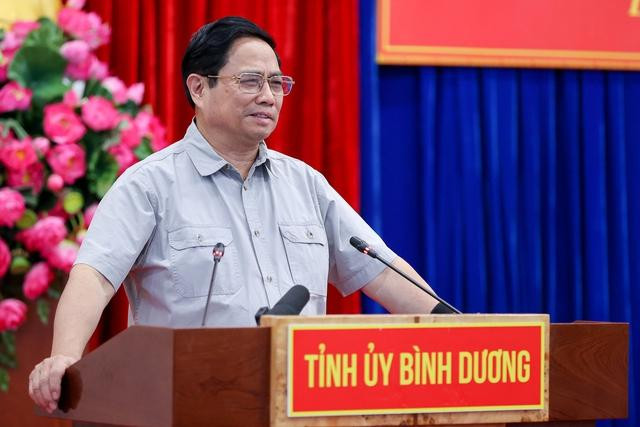 Le Premier ministre Pham Minh Chinh lors de la séance de travail avec les responsables clés de Binh Duong. Photo : VNA.