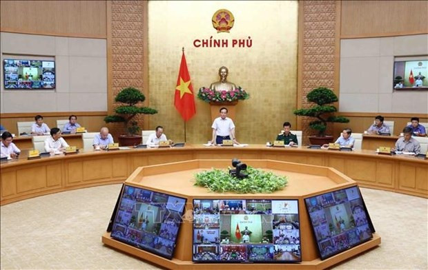  Le Vice-Premier ministre Trân Luu Quang préside la 7e réunion du Comité national de pilotage de la lutte contre la pêche INN. Photo : VNA.