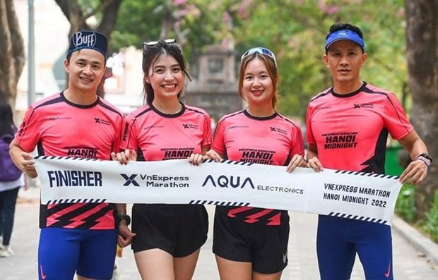 La course nocturne VnExpress Marathon Midnight 2022 attire 10 000 coureurs. Photo : Comité d'organisation