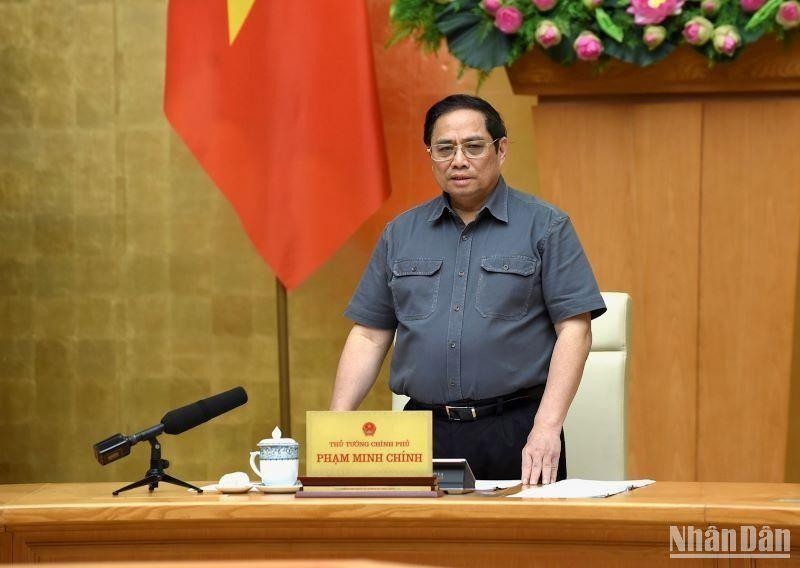 Le Premier ministre Pham Minh Chinh à la réunion. photo : VNA.