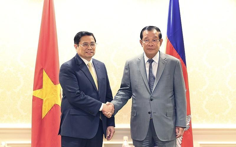 Le Premier ministre vietnamien Pham Minh Chinh et le Premier ministre cambodgien Hun Sen à l'occasion du sommet spécial ASEAN - États-Unis aux États-Unis en mai 2022. Photo : VNA. 