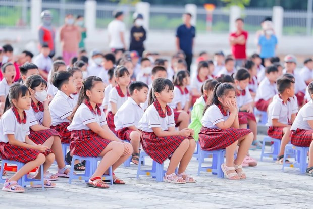 Des élèves dans une activité à l'école. Photo : VNA.