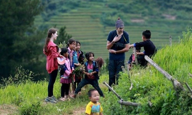 Des traits culturels des minorités ethniques régions montagneuses du Nord séduisent des touristes étrangers. Photo: VNA 