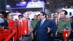 Le Premier ministre Pham Minh Chinh lors du salon professionnel de la sécurité Secutech+ Vietnam, à Ho Chi Minh-Ville, le 14 août. Photo : VNA.