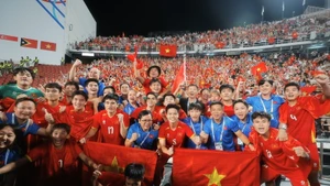 Les joueurs du Vietnam U22 exultent après leur victoire. Photo : VNA.