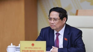 Le Premier ministre Pham Minh Chinh lors de la réunion. Photo : VNA.