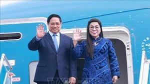 Le Premier ministre Pham Minh Chinh et son épouse, Le Thi Bich Tran. Photo: VNA