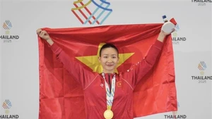 La Vietnamienne Hoàng Thi My Tâm a décroché une médaille d'or dans la catégorie des moins de 61 kg. Photo : VNA/CVN.