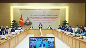 Vue d'ensemble de la conférence nationale, à Hanoi, le 30 décembre. Photo: VNA