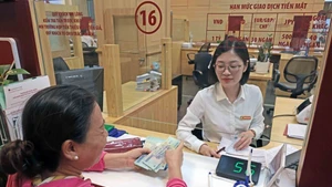 Au 28 juillet, l'encours total des prêts avait augmenté de 9,64% par rapport à la fin de l'année dernière, a indiqué la Banque d’État du Vietnam (BEV) dans un communiqué publié sur son site web. Photo : VNA/CVN