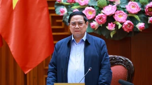 Le Premier ministre Pham Minh Chinh s'exprime lors de la réunion. Photo : VNA.