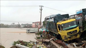 Dégâts causés par les inondations historiques dans le quartier de Phu Yen, province de Dak Lak. Photo : VNA.
