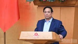 Le Premier ministre Pham Minh Chinh a appelé à des efforts concertés pour atteindre tous les objectifs fixés pour 2025. Photo : NDEL.