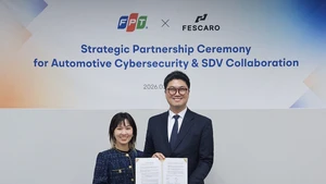 La cérémonie de signature de l'accord de coopération entre FPT et FESCARO tenue en République de Corée. Photo : FPT.