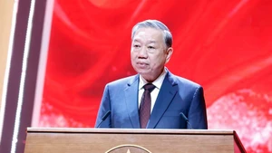 Le secrétaire général du Parti, To Lam, présent à la cérémonie marquant les 80 ans du renseignement de la Police populaire. Photo : VNA.