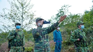 Patrouille des gardes-frontières vietnamiens et chinois à la borne frontière n°3 le long de la frontière entre le Vietnam et la Chine. Photo: VNA